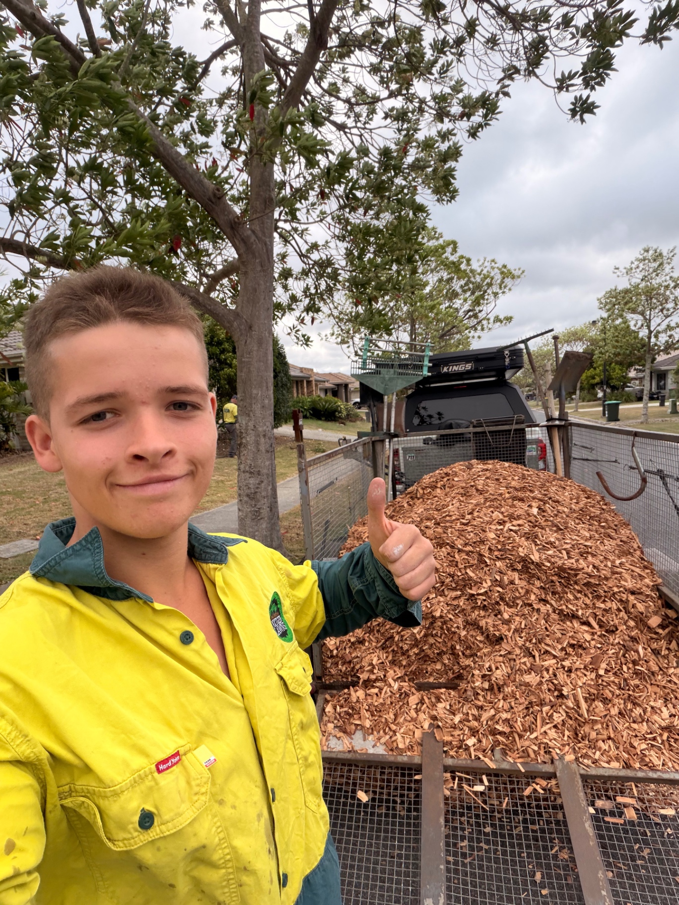 NxtGen crew with a trailer load of mulch